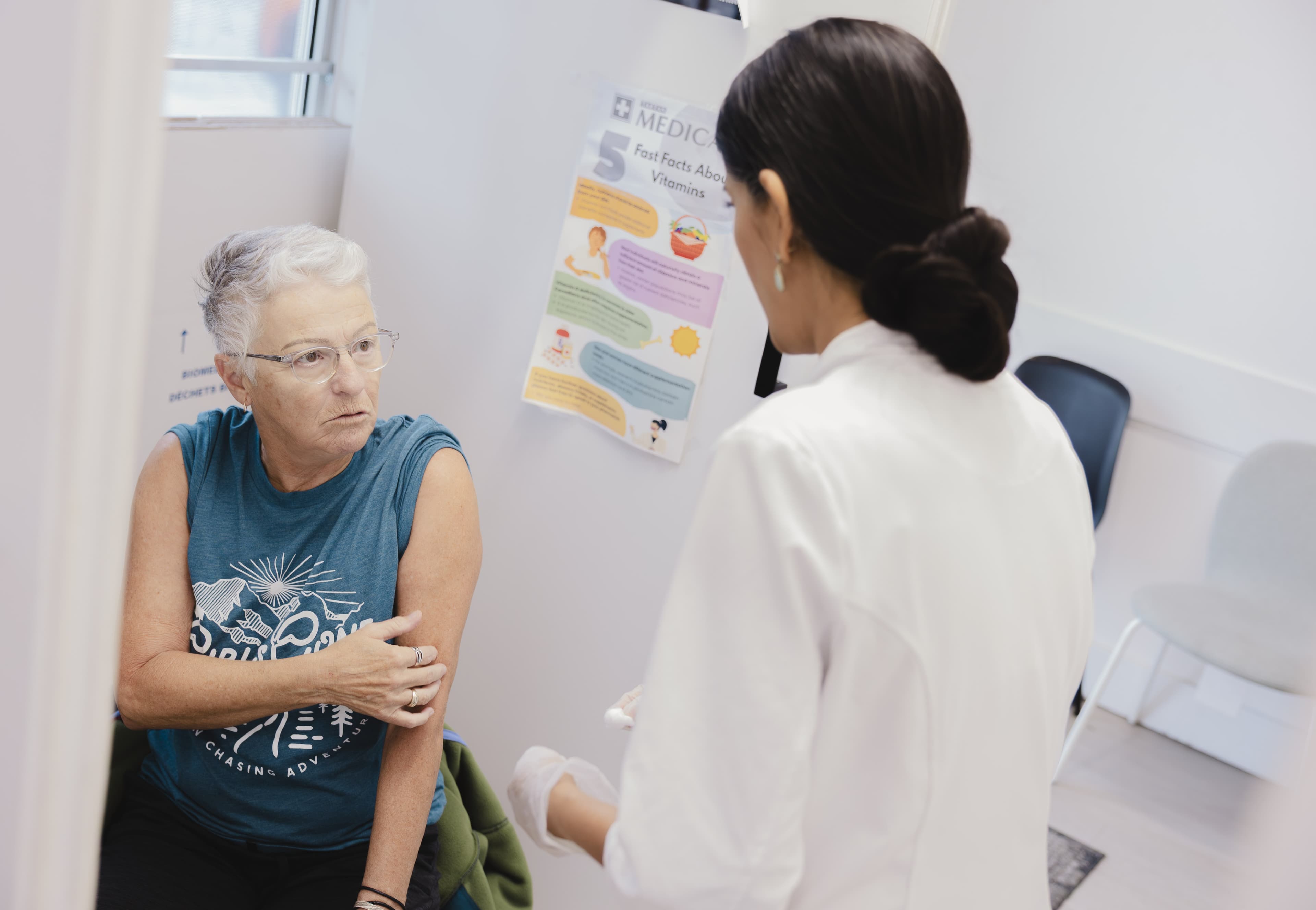 Private health consultation with senior patient