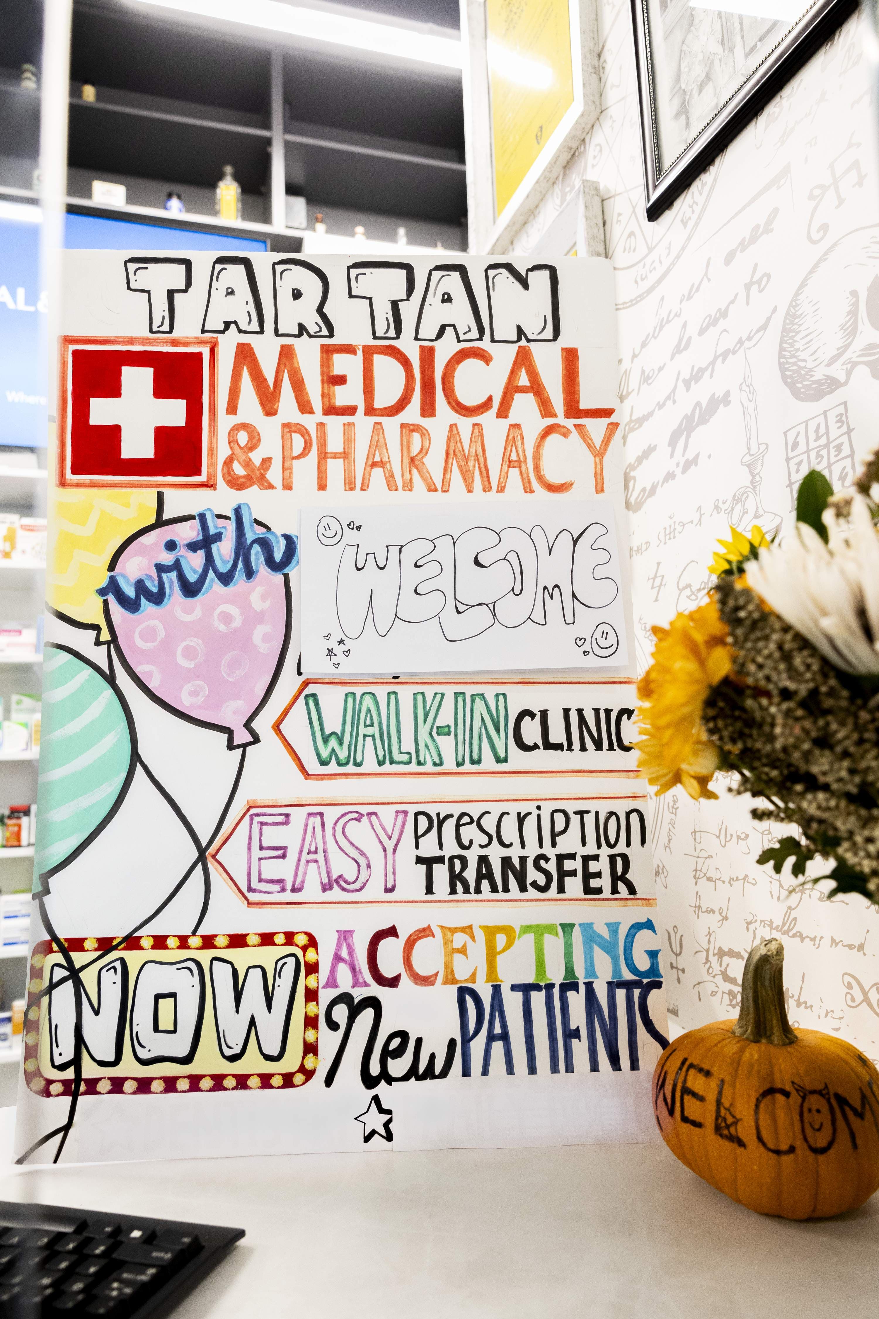 Tartan Pharmacy welcome sign and walk-in clinic